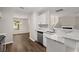 Bright kitchen overlooking the Gathering room featuring stainless appliances and granite counters at 240 Eagle Ridge Rd, Summerville, SC 29485