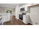 Modern kitchen with stainless appliances, white cabinetry, and granite countertops at 240 Eagle Ridge Rd, Summerville, SC 29485