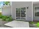 Backyard patio with a sliding glass door and view of the house with gray siding at 240 Eagle Ridge Rd, Summerville, SC 29485