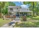 Beautiful backyard with a stone bar, built-in grill, and outdoor seating perfect for entertaining at 25 Fitzroy Dr, Charleston, SC 29414