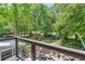 Enjoy backyard views from the deck, looking out over the outdoor kitchen and meticulously kept grounds at 25 Fitzroy Dr, Charleston, SC 29414