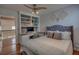 This bedroom is equipped with built-in shelves and workspace at 25 Fitzroy Dr, Charleston, SC 29414