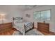 Cozy bedroom with decorative bed and hardwood floors at 25 Fitzroy Dr, Charleston, SC 29414