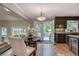 Cozy dining area with views of the backyard through the bright patio doors at 25 Fitzroy Dr, Charleston, SC 29414