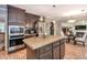 Charming kitchen featuring granite countertops, wooden cabinets, stainless steel appliances, and a kitchen island at 25 Fitzroy Dr, Charleston, SC 29414