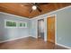 Bedroom featuring wood ceiling, hardwood floors, with closet and doors at 263 Gator Walk, Ridgeville, SC 29472