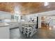 Charming kitchen with butcher block counters, an island, stainless appliances and slate floors at 263 Gator Walk, Ridgeville, SC 29472