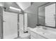 Clean bathroom features a glass enclosed shower, white cabinets, and stylish fixtures at 2844 Pinelog Ln, Johns Island, SC 29455