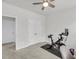 Bright room featuring exercise equipment and neutral tones and carpet with access to other rooms at 2844 Pinelog Ln, Johns Island, SC 29455