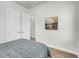 Relaxing bedroom features neutral walls, wood flooring, and a comfortable bed with decorative pillows at 2844 Pinelog Ln, Johns Island, SC 29455