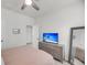 Bedroom featuring neutral carpet, dresser and access to other rooms at 2844 Pinelog Ln, Johns Island, SC 29455