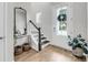 Inviting foyer features a staircase, stylish decor, and a view of the front door at 2844 Pinelog Ln, Johns Island, SC 29455
