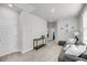 Cozy living room with neutral carpet, a gray sofa and an access to other rooms at 2844 Pinelog Ln, Johns Island, SC 29455