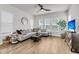 Comfortable living room offering a serene ambiance enhanced by neutral tones and hardwood flooring at 2844 Pinelog Ln, Johns Island, SC 29455
