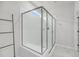 Modern walk-in shower featuring clear glass, bright tiles and a small window for natural light at 2844 Pinelog Ln, Johns Island, SC 29455