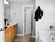 Bathroom showcasing a tub, vanity, and open doorway, well-lit for functionality at 300 Greens Ct, Goose Creek, SC 29445