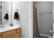 A full bath with a shower curtain and towel bar at 300 Greens Ct, Goose Creek, SC 29445