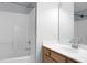 Clean bathroom featuring a shower-tub combo and a sleek vanity at 300 Greens Ct, Goose Creek, SC 29445