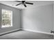 Bedroom with window and neutral carpet, offering a blank slate for personalization at 300 Greens Ct, Goose Creek, SC 29445