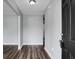 View of the home's light-filled entryway showcasing the modern flooring and neutral wall colors at 300 Greens Ct, Goose Creek, SC 29445