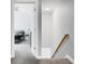 Hallway leading to bedroom, featuring stairs with wooden handrail at 300 Greens Ct, Goose Creek, SC 29445