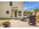 Paver patio features a grill and plenty of room for entertaining guests or relaxing outdoors at 300 Greens Ct, Goose Creek, SC 29445