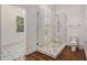 Bathroom featuring frameless shower, stylish tile flooring and marble counters at 3002 Edenvale Rd, Johns Island, SC 29455