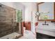 Modern bathroom with beautiful tile work, glass enclosed shower, and vanity with updated fixtures at 3002 Edenvale Rd, Johns Island, SC 29455