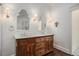 Dual vanity bathroom with marble counters, custom mirrors and wooden cabinetry at 3002 Edenvale Rd, Johns Island, SC 29455