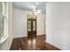 Bright, spacious bedroom with wood floors and French doors leading to the outside at 3002 Edenvale Rd, Johns Island, SC 29455