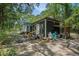 Outdoor area with utility shed, barbecue and tanks at 3002 Edenvale Rd, Johns Island, SC 29455