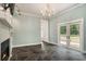 Bright living room features stone floors and French doors leading to the outdoor deck at 3002 Edenvale Rd, Johns Island, SC 29455