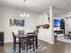 Cozy dining area adjacent to a modern living room, perfect for Gathering meals at 312 Silverdrop St, Goose Creek, SC 29445