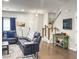 Comfortable living room featuring a staircase, stylish furniture, and a cozy atmosphere at 312 Silverdrop St, Goose Creek, SC 29445