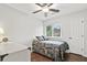 Small bedroom with a twin bed, dresser, and window overlooking the trees at 313 Janice St, Goose Creek, SC 29445