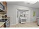 Eat-in kitchen features bay window and stainless steel appliances and ceramic tile floor at 313 Janice St, Goose Creek, SC 29445