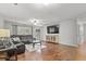 Inviting living room featuring a leather sofa, a TV, hardwood floors and lots of light at 313 Janice St, Goose Creek, SC 29445