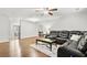 Comfortable living room with hardwood floors, leather sofa and lots of space at 313 Janice St, Goose Creek, SC 29445