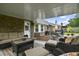 Covered patio with outdoor seating and grilling area at 313 Janice St, Goose Creek, SC 29445