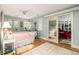Tranquil bedroom with hardwood floors, french doors and sliding mirrored door at 34 Formosa Dr, Charleston, SC 29407