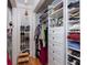 Walk-in closet with custom shelving, drawers, and organization system, maximizing storage and accessibility at 34 Formosa Dr, Charleston, SC 29407