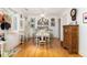 Charming dining area with hardwood floors, lots of decor, and a unique color scheme at 34 Formosa Dr, Charleston, SC 29407