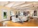 Spacious living area with hardwood floors, fireplace, and built-in bookshelves, offering an elegant living space at 34 Formosa Dr, Charleston, SC 29407