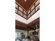 Bright living room features wood ceiling, recessed lighting, and wall of windows at 34 Formosa Dr, Charleston, SC 29407