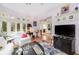 Cozy living room featuring hardwood floors and ample natural light at 34 Formosa Dr, Charleston, SC 29407