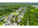 An aerial view of the community with a variety of architectural styles and lush surroundings at 3413 Acorn Drop Ln, Johns Island, SC 29455