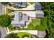 Aerial view showcasing the home's backyard patio and well-manicured lawn at 3413 Acorn Drop Ln, Johns Island, SC 29455