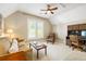 Cozy bedroom with bright natural light, and a workspace with built in desk at 3413 Acorn Drop Ln, Johns Island, SC 29455
