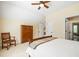 Bedroom featuring ceiling fan, bed, wooden furniture, and an open doorway to another room at 3413 Acorn Drop Ln, Johns Island, SC 29455