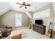 Inviting bedroom with neutral walls, ceiling fan and large windows at 3413 Acorn Drop Ln, Johns Island, SC 29455
